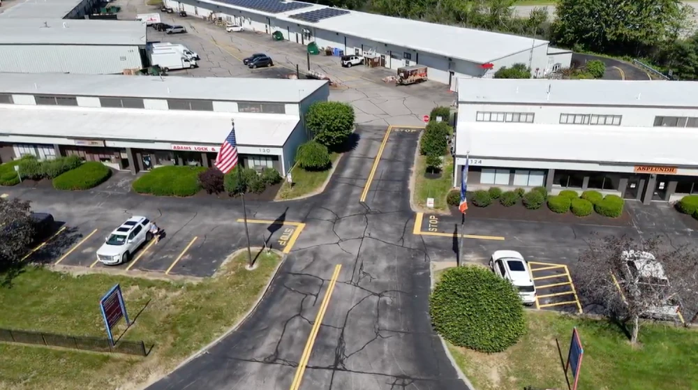 Aerial view of Concord Business Center buildings and shared parking on Hall Street